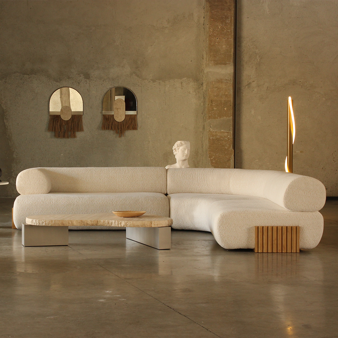 modern living room layout featuring the Carmel sculptural sofa for fluid energy flow and grounded comfort.marie burgos collection.png