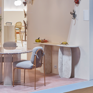 Sculptural console table displayed in a modern interior setting, highlighting its versatility for both indoor and outdoor use.