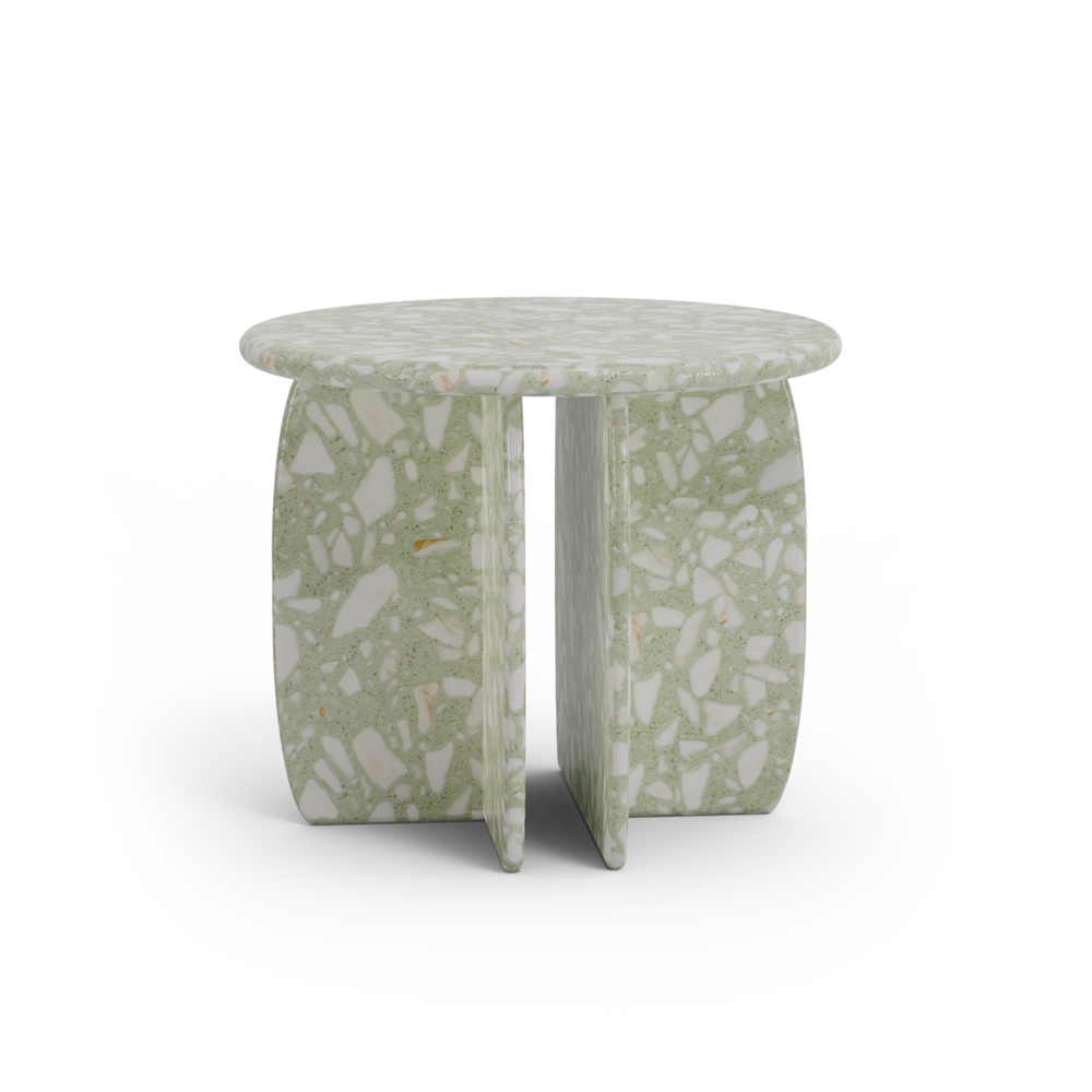 Minimalist terrazzo side table front view with intersecting base and soft green tones