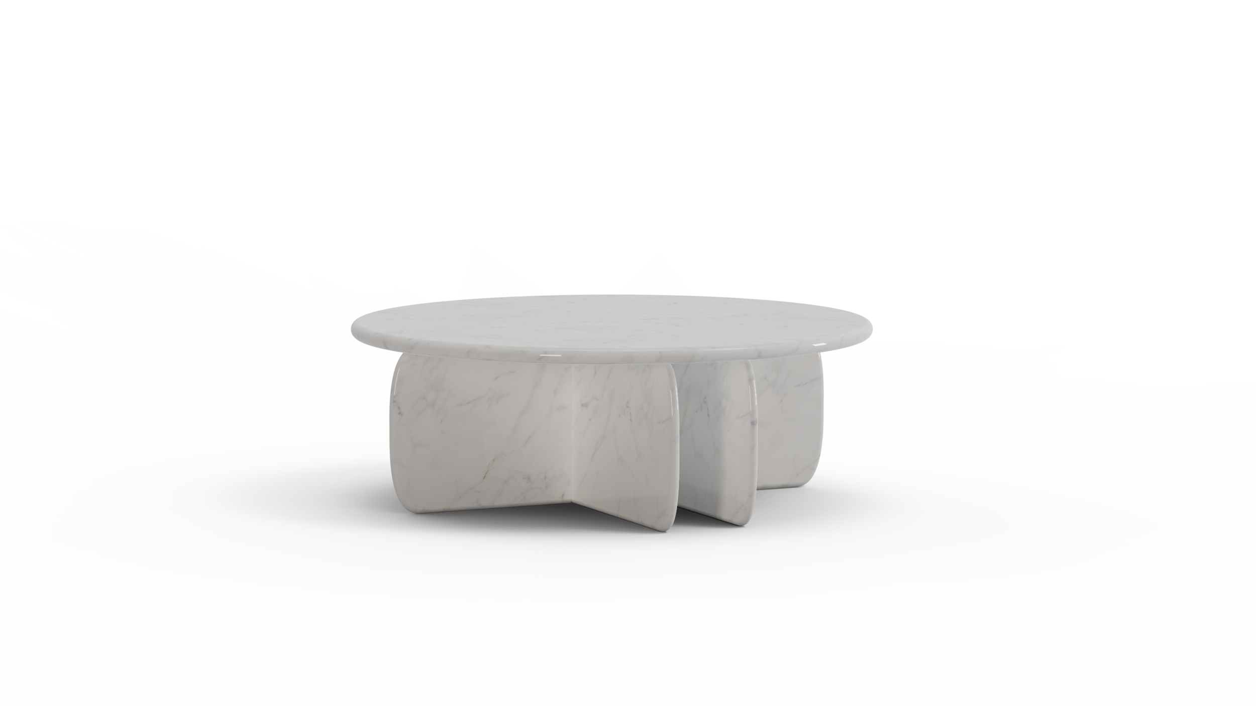 Minimalist white marble table with rounded sculptural legs and circular slab top