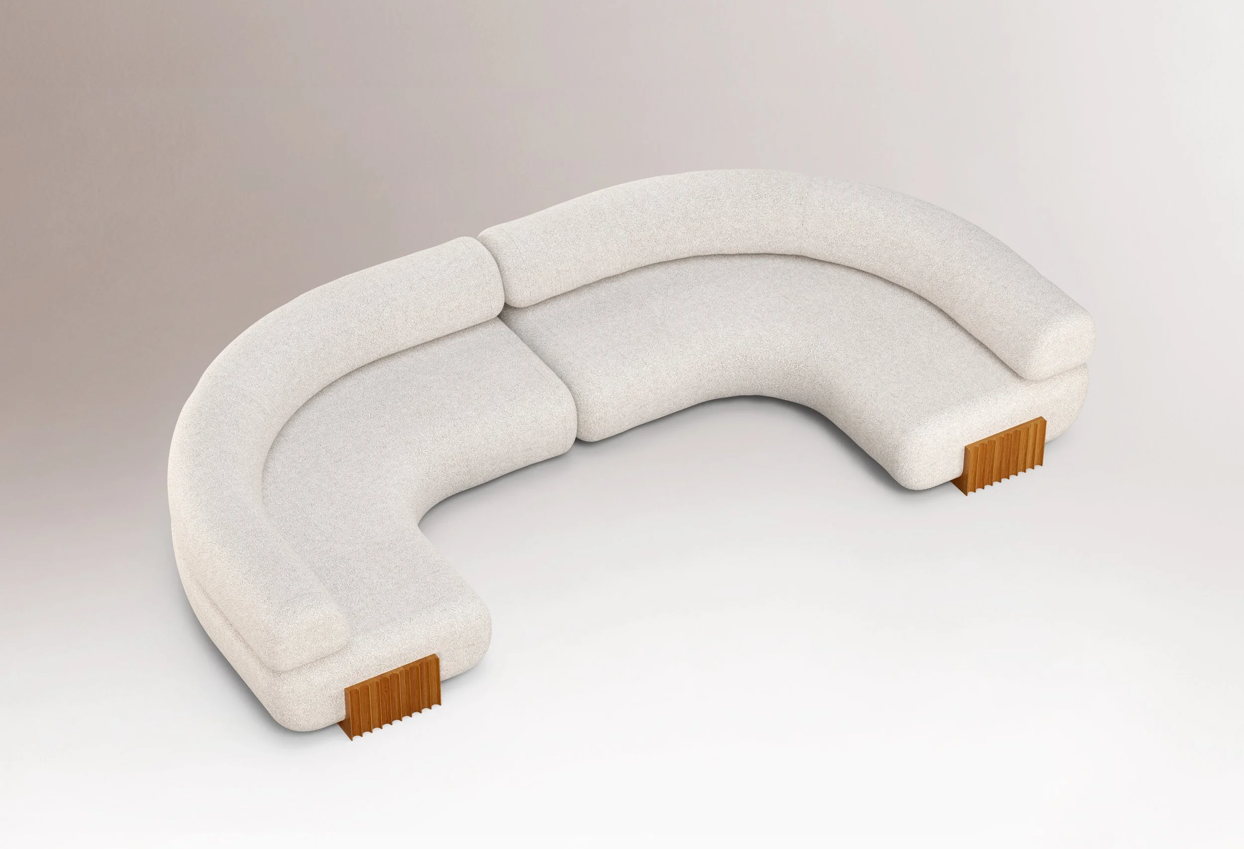 Overhead view of the two interlocking Carmel modules, showing the seamless connection between the rounded seating sections.