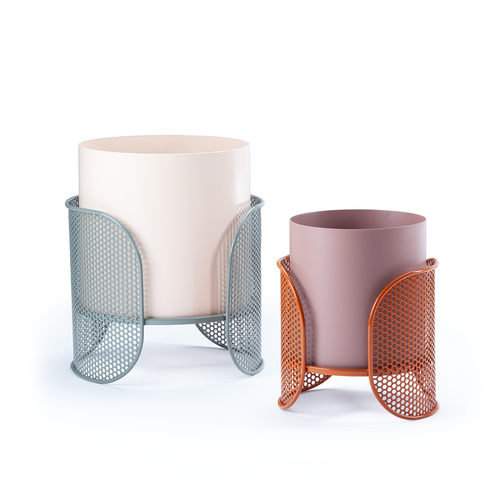 Riviera vases collection with clean cylindrical forms and sculptural bases, designed for contemporary decorative use.