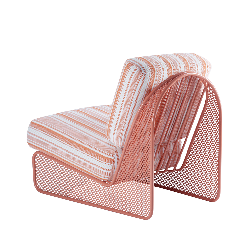 Rear view of the Riviera Armchair highlighting the curved perforated metal back and breathable design for indoor-outdoor luxury.