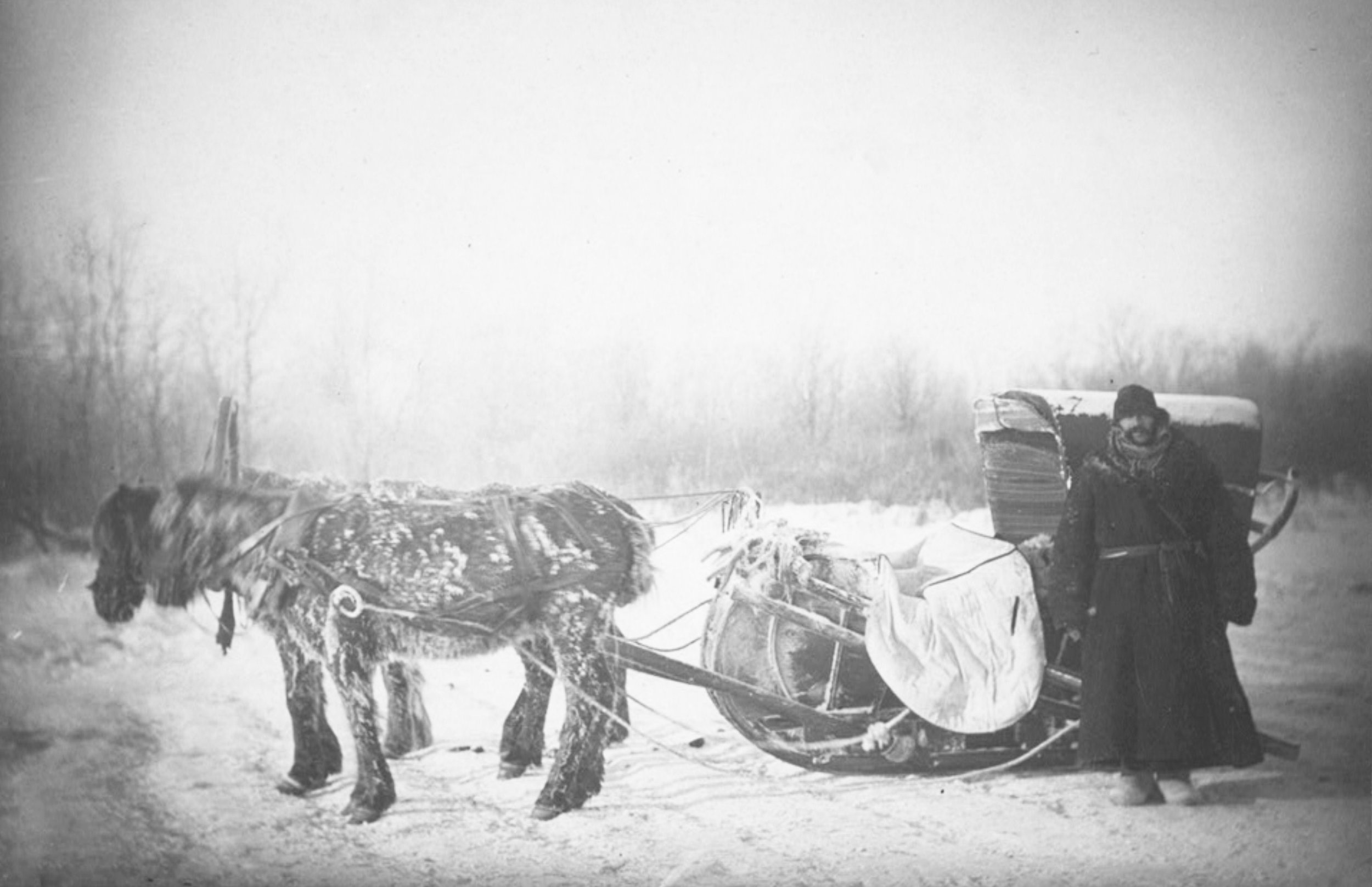 12. Kennan next to his horse-drawn povoska during his Siberian exile investigation, 1886.jpg