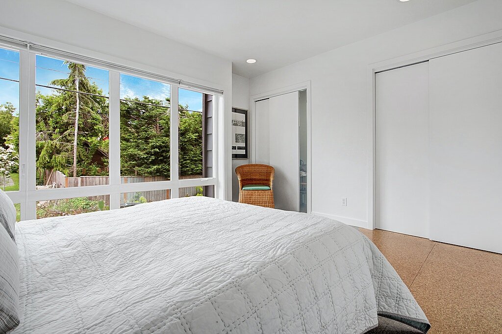  Two double closets gives this room plenty of space and there are multi-directional blinds throughout the home. 