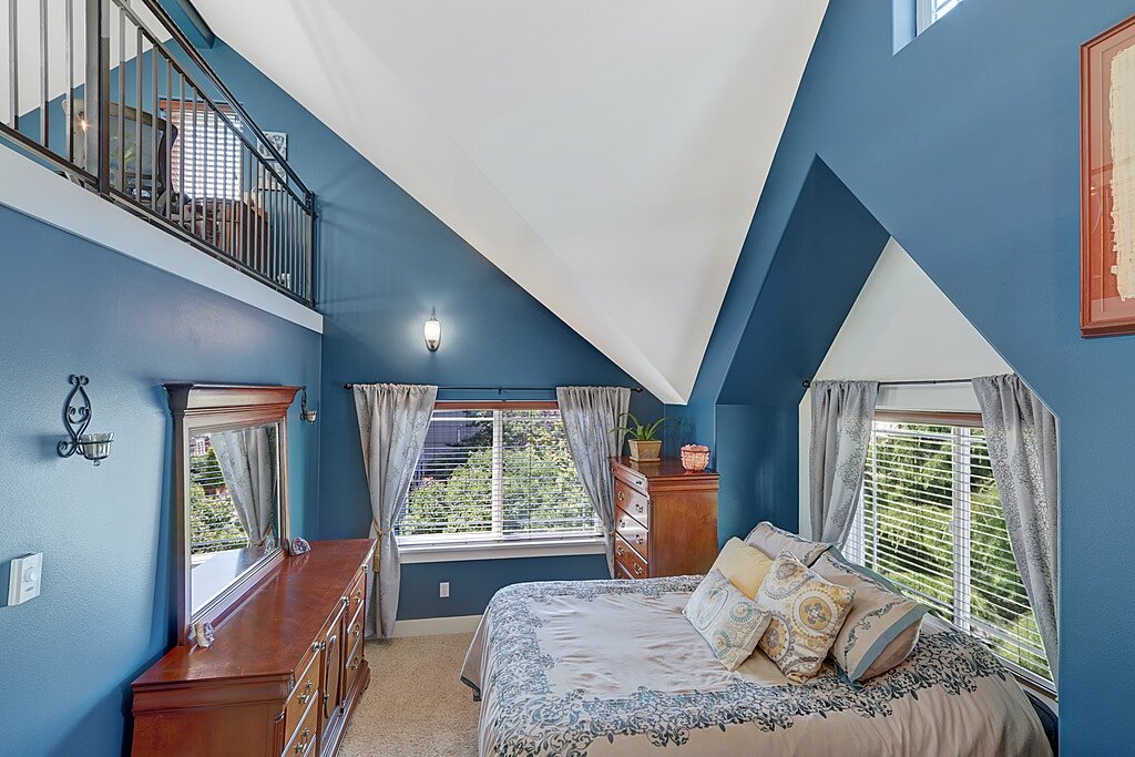  With room for a large dresser, there is also a walk-in closet and above a bonus loft space. 