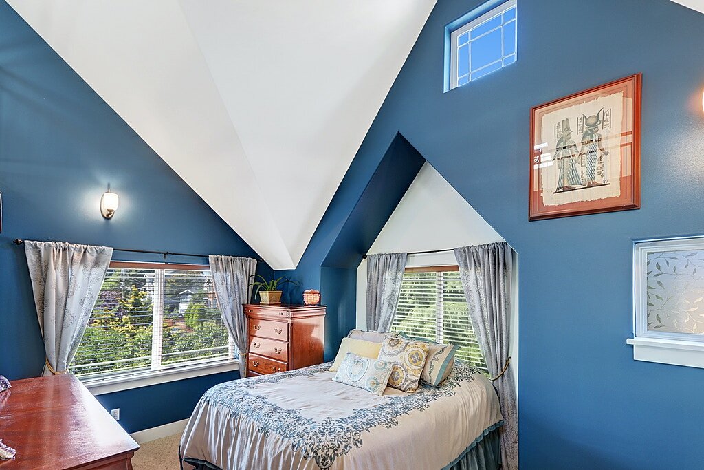  The master bedroom has a cathedral-like quality with the vaulted ceiling that go all the way to skylights above. 