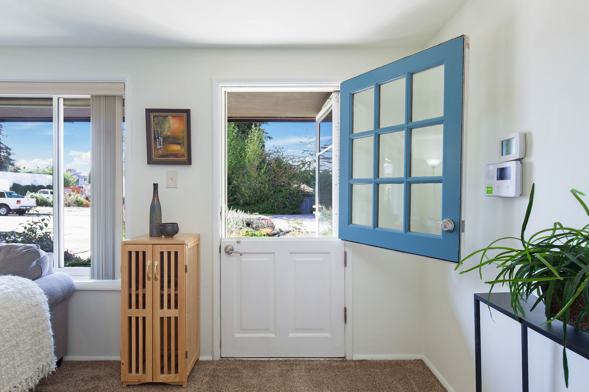  Fun dutch door to bring in fresh air to the home and chat with the great neighbors. 