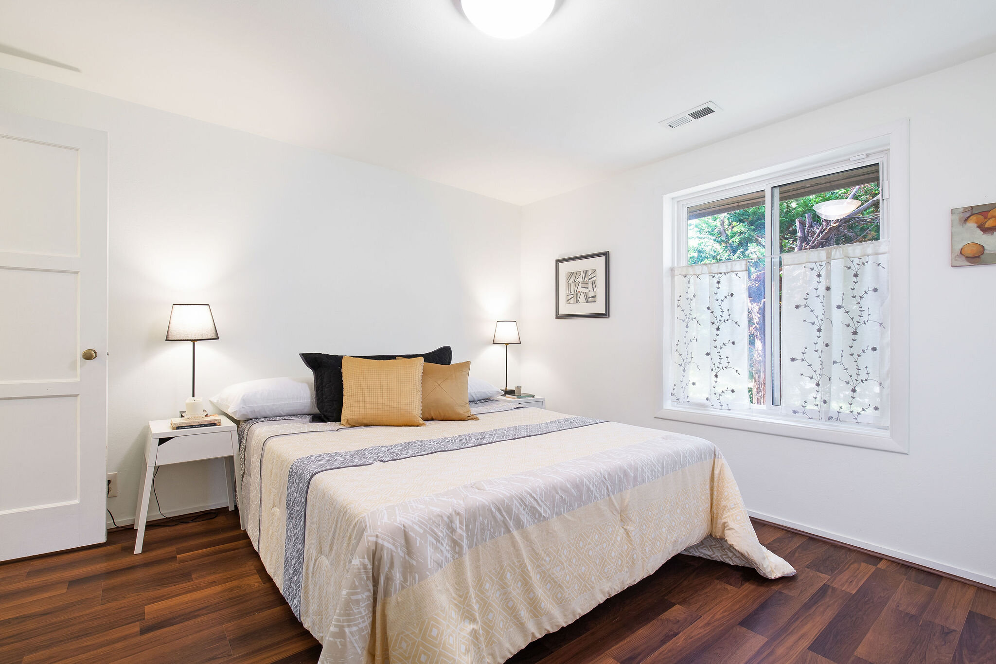  There are vinyl windows throughout the house and new light fixtures in this bedroom.   