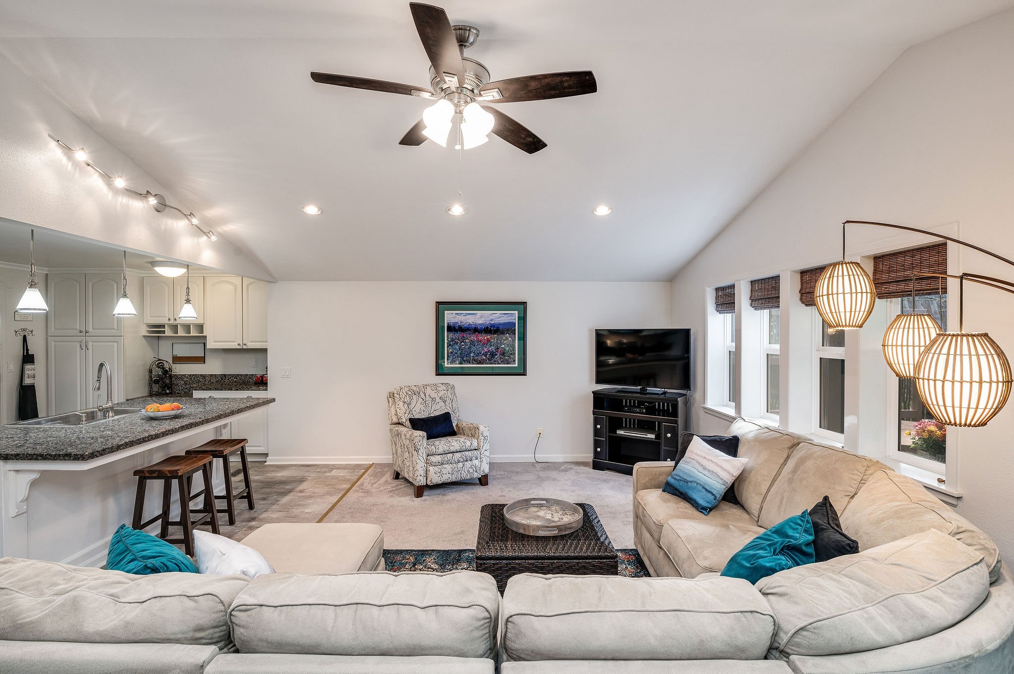 Large family room with vaulted ceilings.