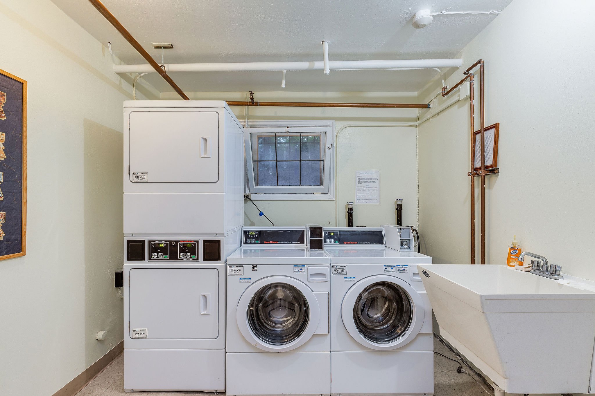 The laundry room is downstairs with free laundry for all residents.