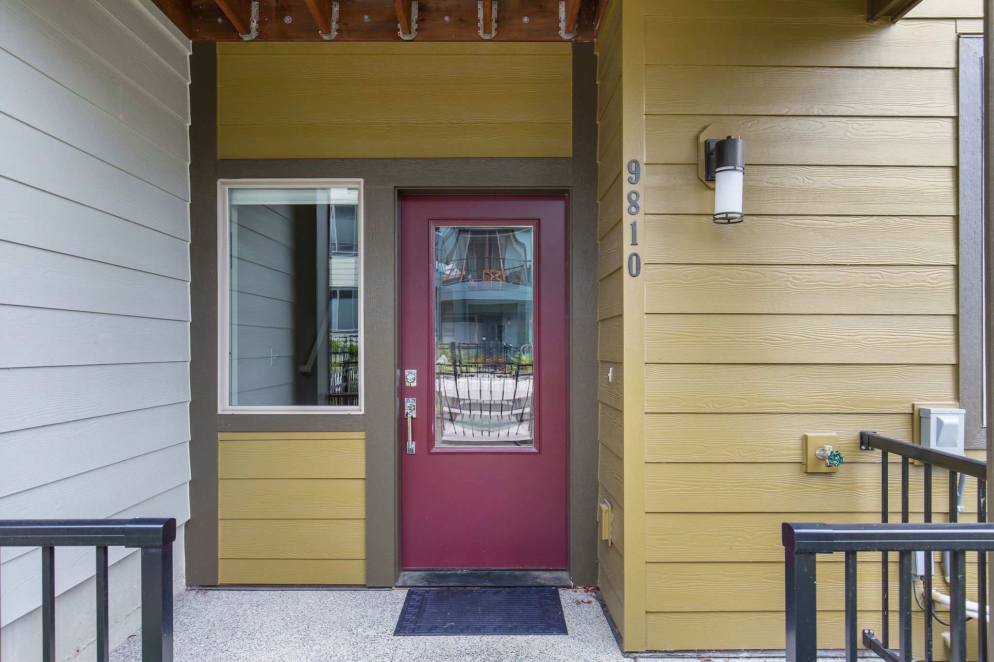  image description: view of red front door to townhome 