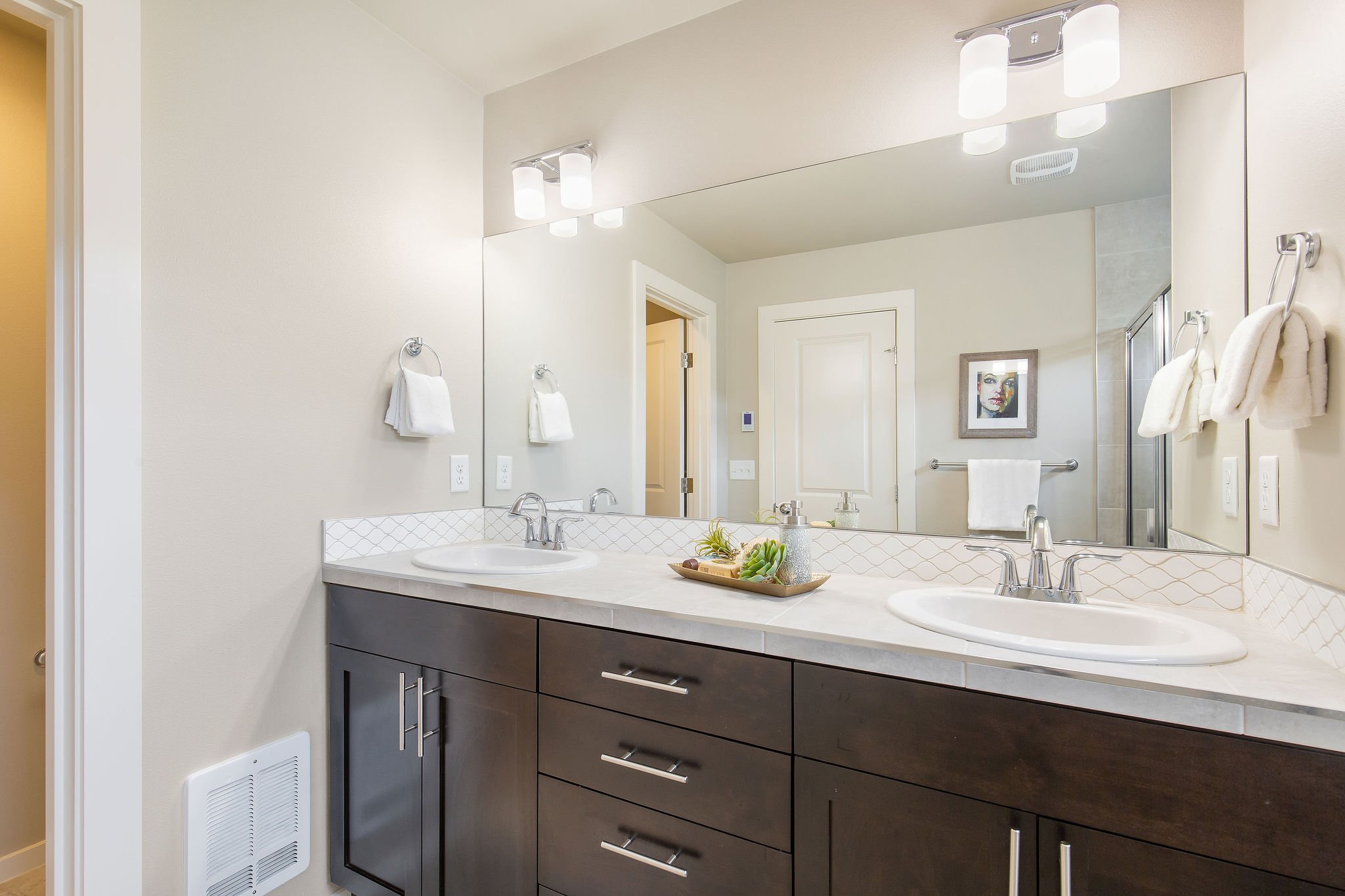  interior of master bathroom with 2 sinks  