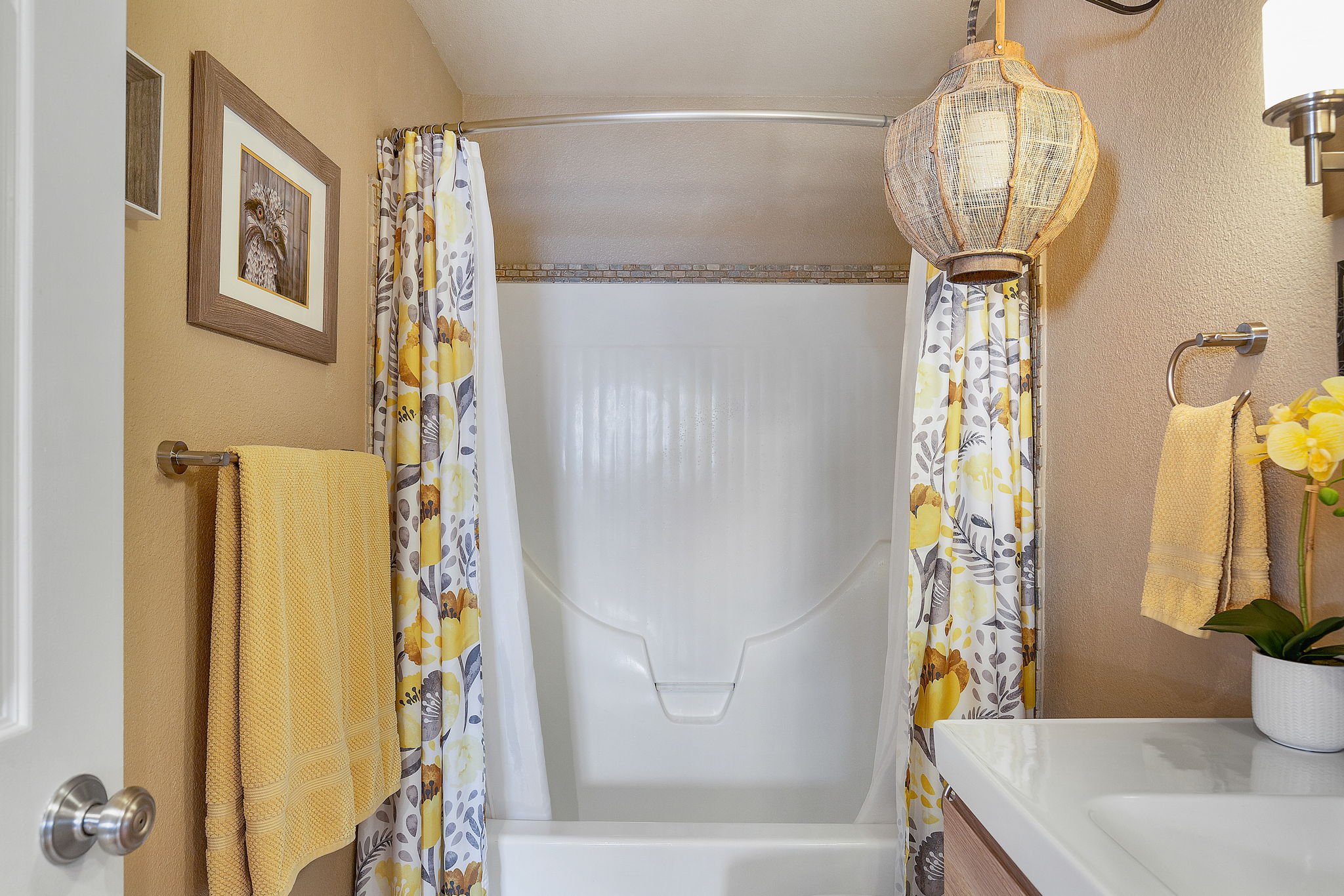 interior of bedroom with shower and bathtub combo  