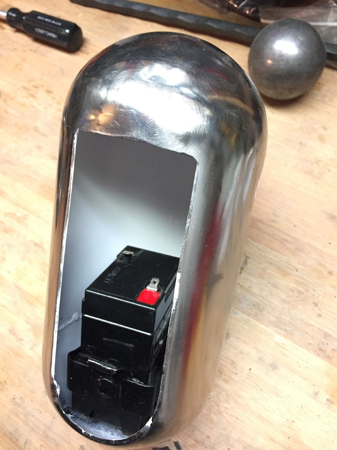 I welded the pill shaped tank to hold the battery and electronics.