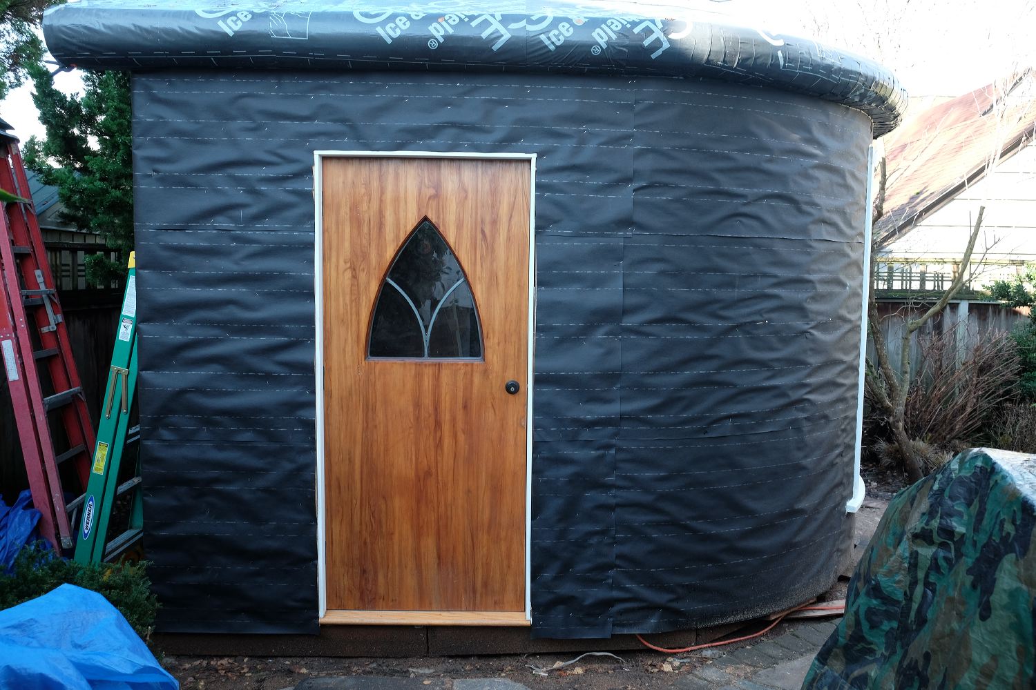 I bought this door on Craigs List and cut it down to fit.