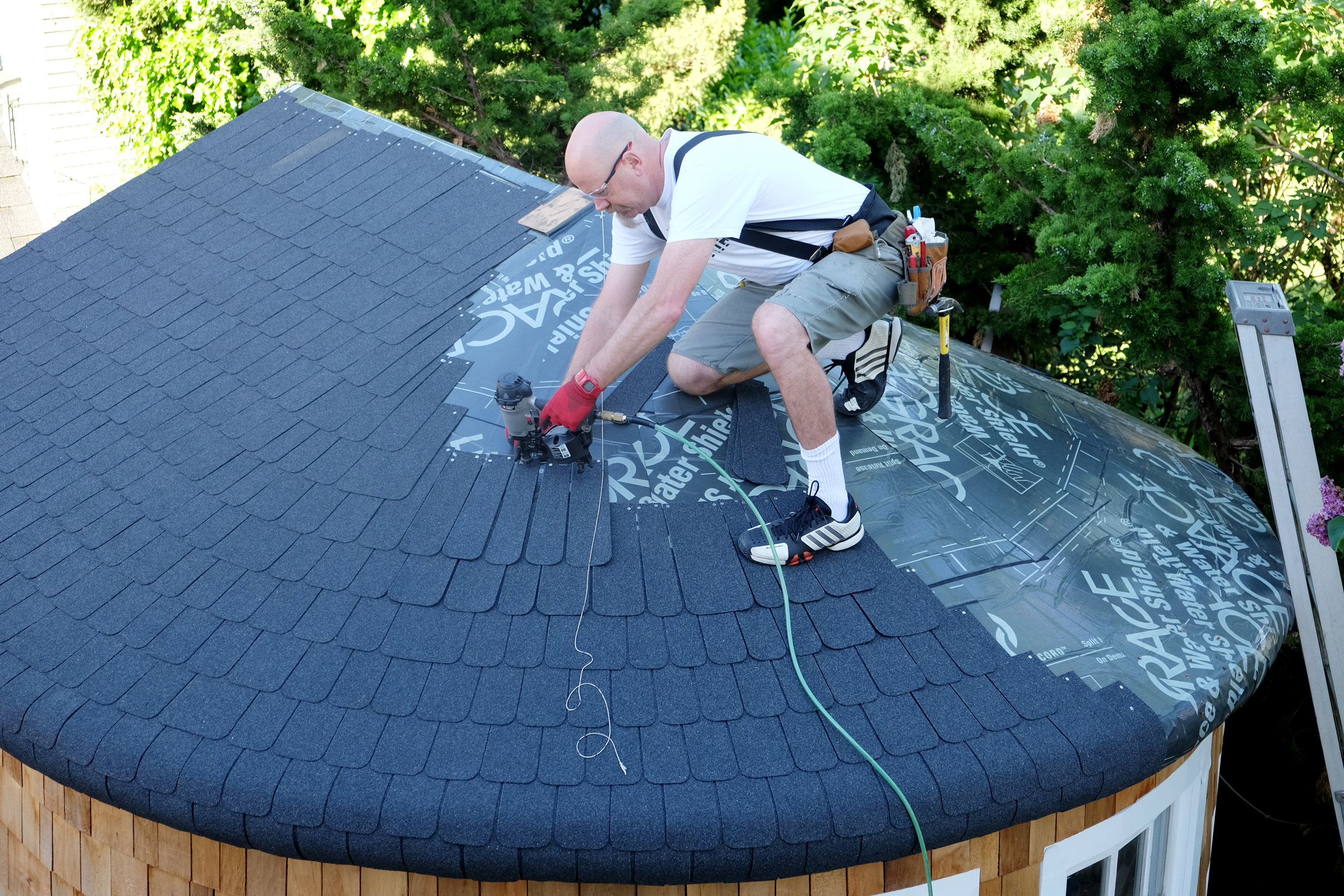 I used a coil roofing nailer to attach the shingles.