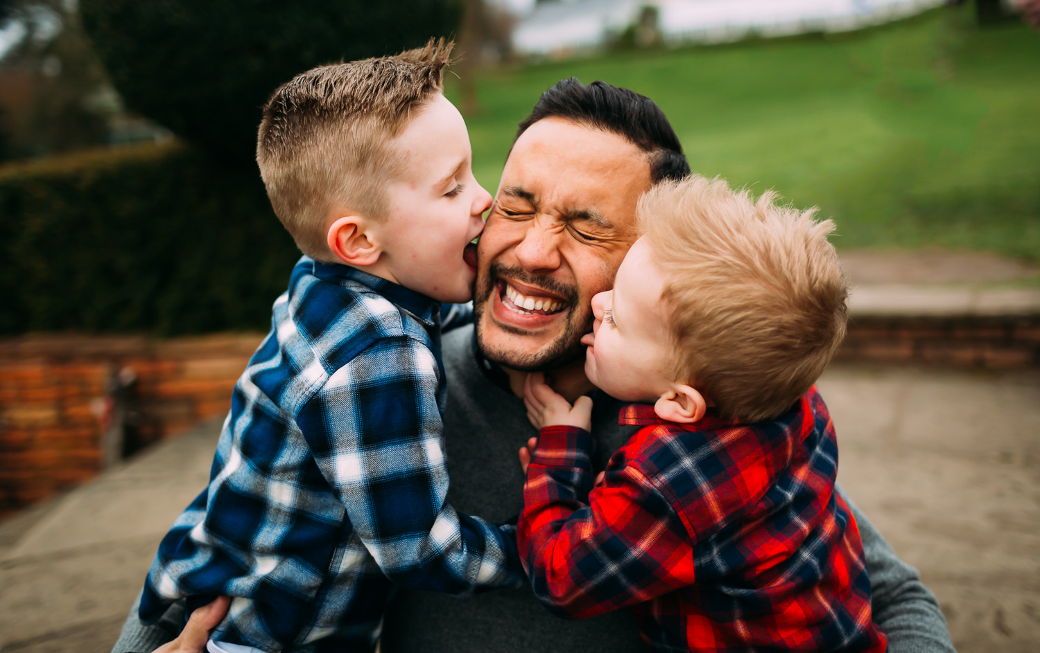 LGBTQ family having fun in botanical gardens
