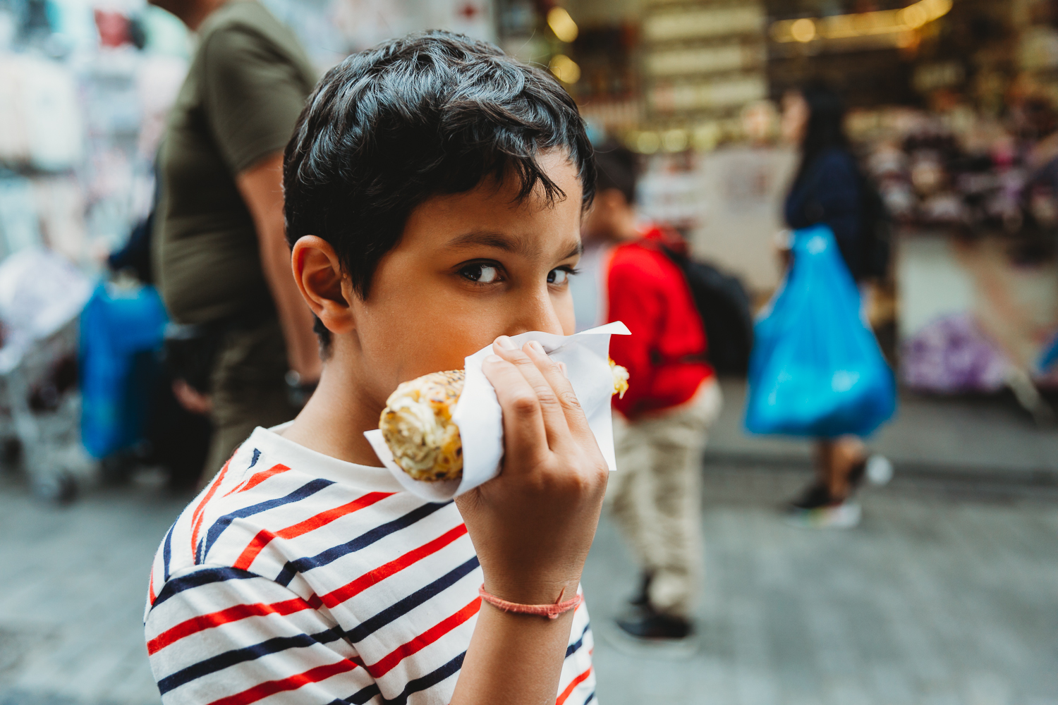 boy eating sauteed corn