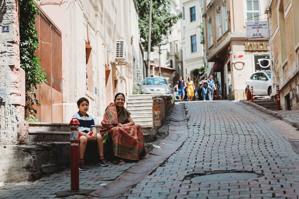 granny and boy resting on an uphill walk