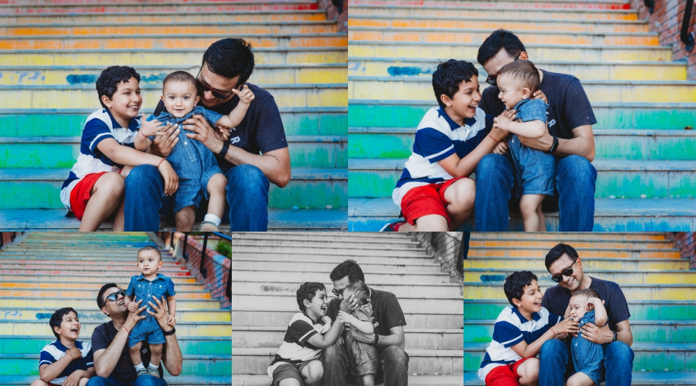 dad with sons laughing hugging smiling