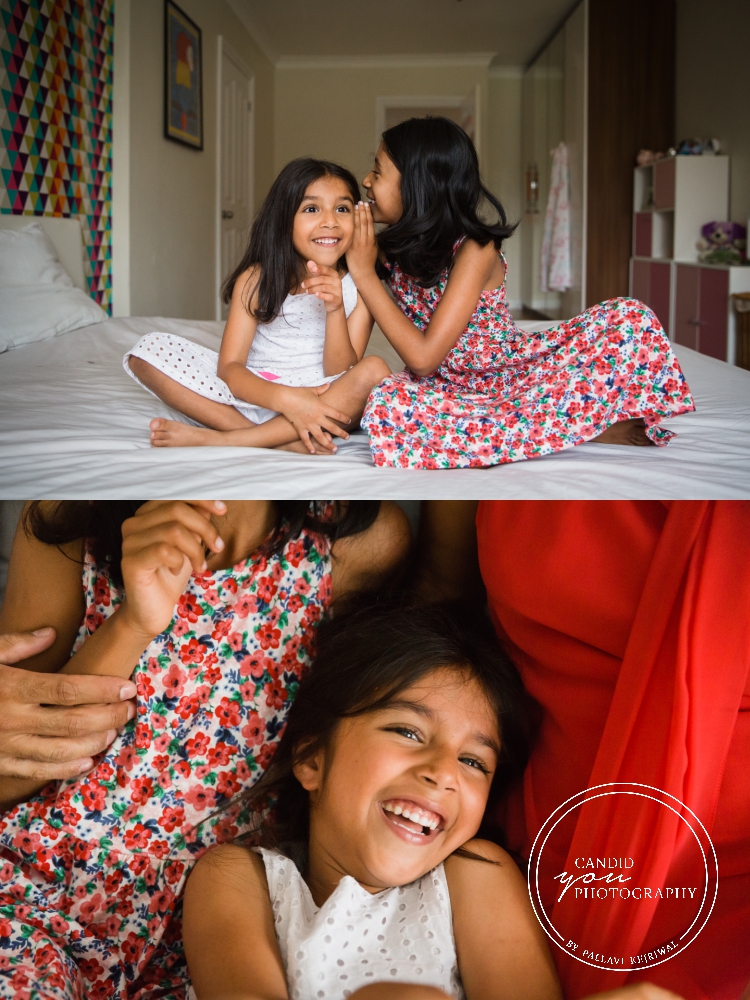 sisters sharing secrets and enjoying during in home family photo session