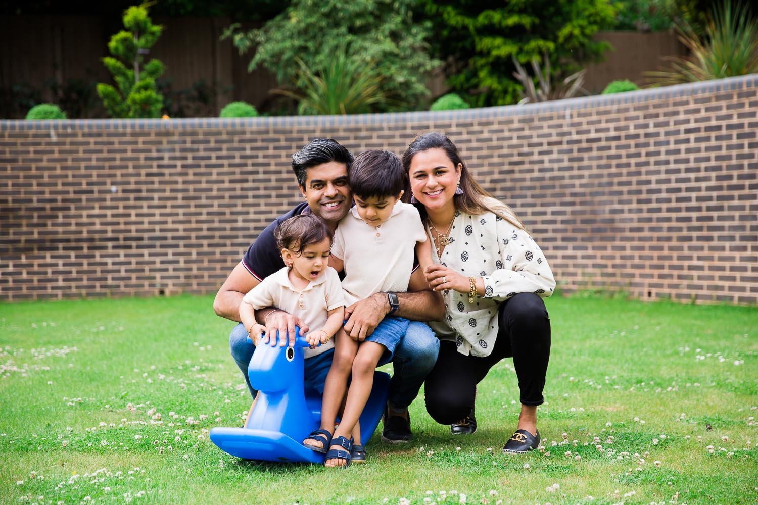 In-Home Family Photo Session In Wimbledon with family time spent in their own garden