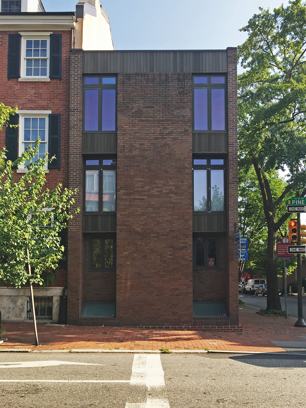 Photo of a Brick Modern home at the corner of 5th and Pine Streets.