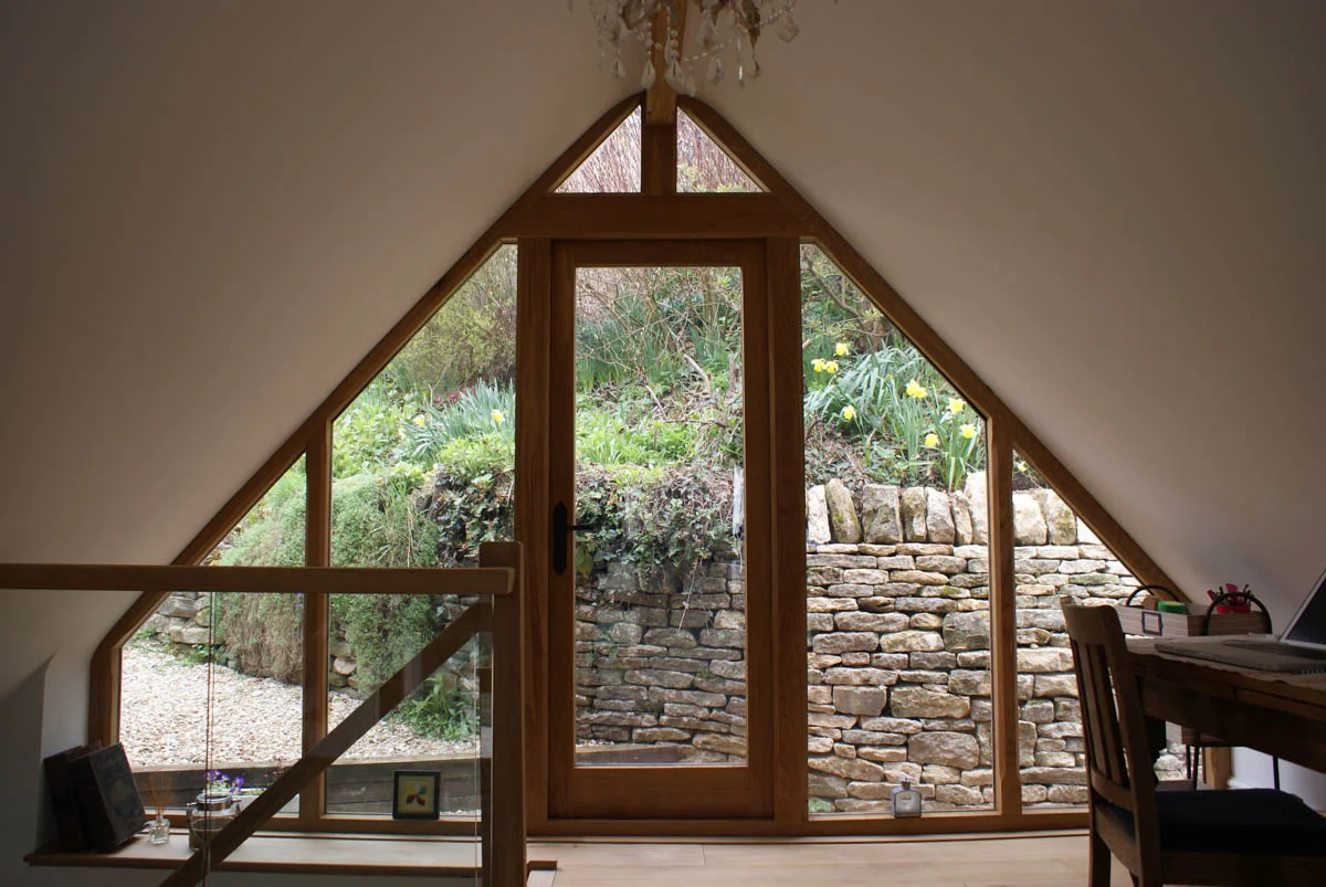 oak and glass extension to house in cotswolds stroud gloucestershire