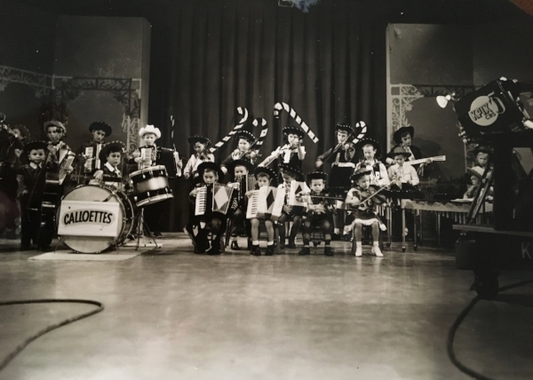 During the two weeks surrounding Christmas of 1954, the Calloettes played 23 concerts in the SF Bay Area. Remarkably, Mr. and Mrs. Callo collected fees, while the musicians and their parents received no remuneration for their efforts. By this point, Tom ( front row, second from right ) plays the violin. 