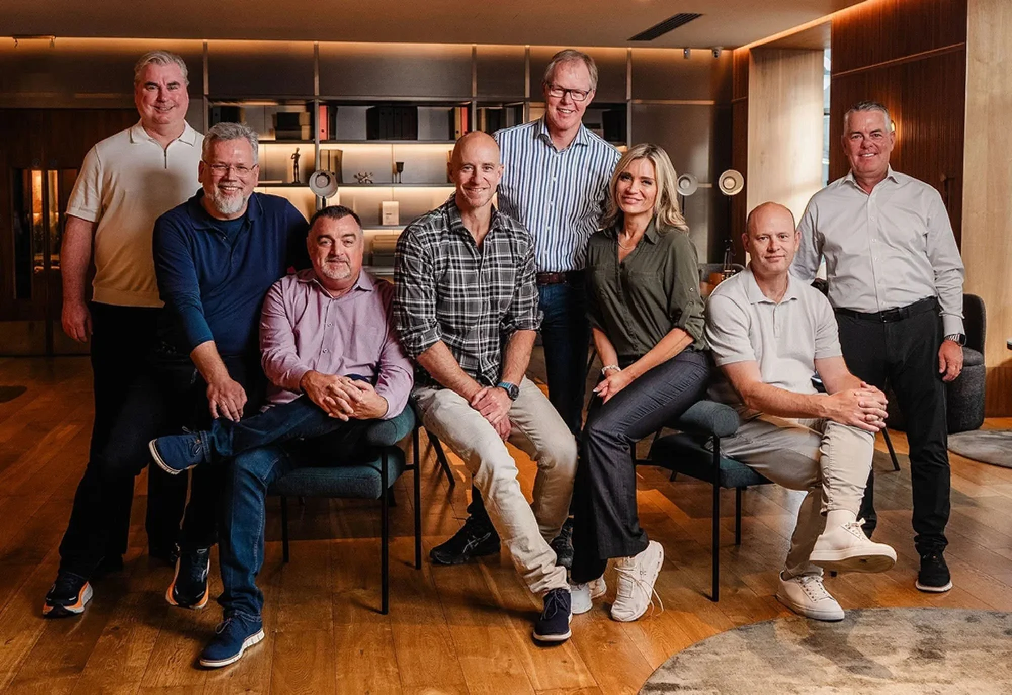 Leadership team group portrait of nine business executives in a modern office, photographed in Dublin by Roger Kenny