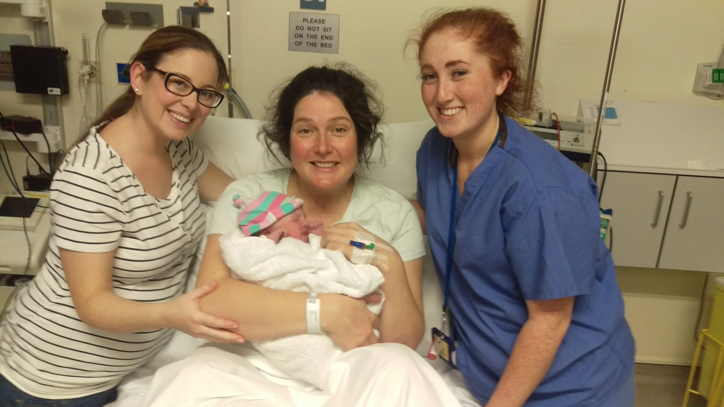 Monica and Anouk, with Midwife Amy and Doula Jen. 