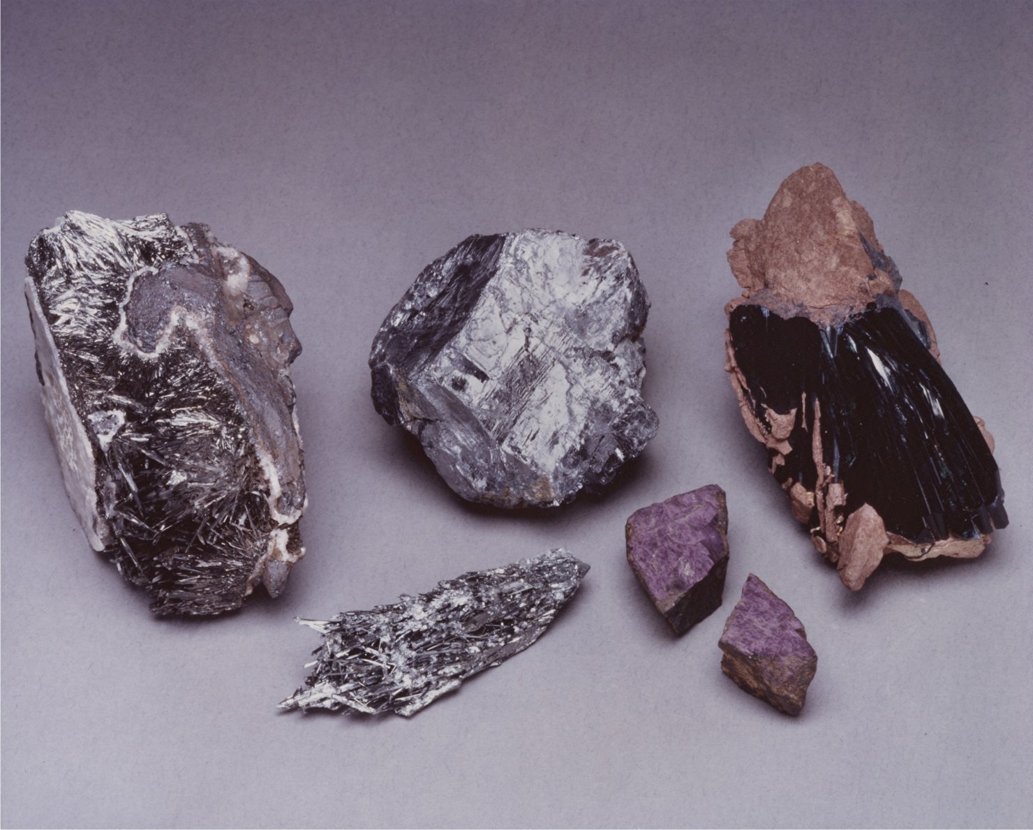 Pyrolusite, Stibnite, Galena, Purpurite and Vivianite.jpg