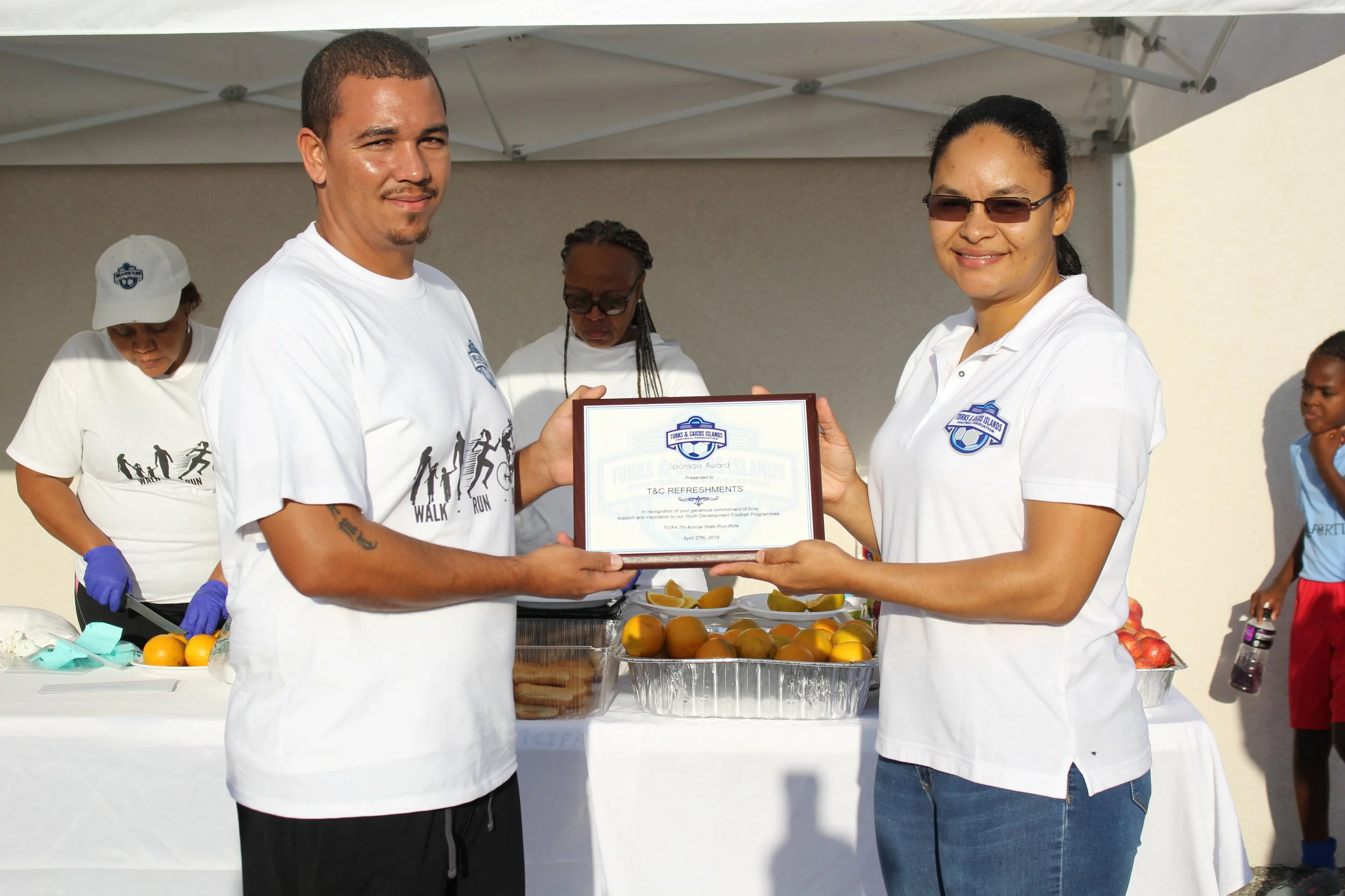 TCIFA partners with T&amp;C Refreshments for the 2nd consecutive year to host the 7th Annual Walk-Run-Ride
