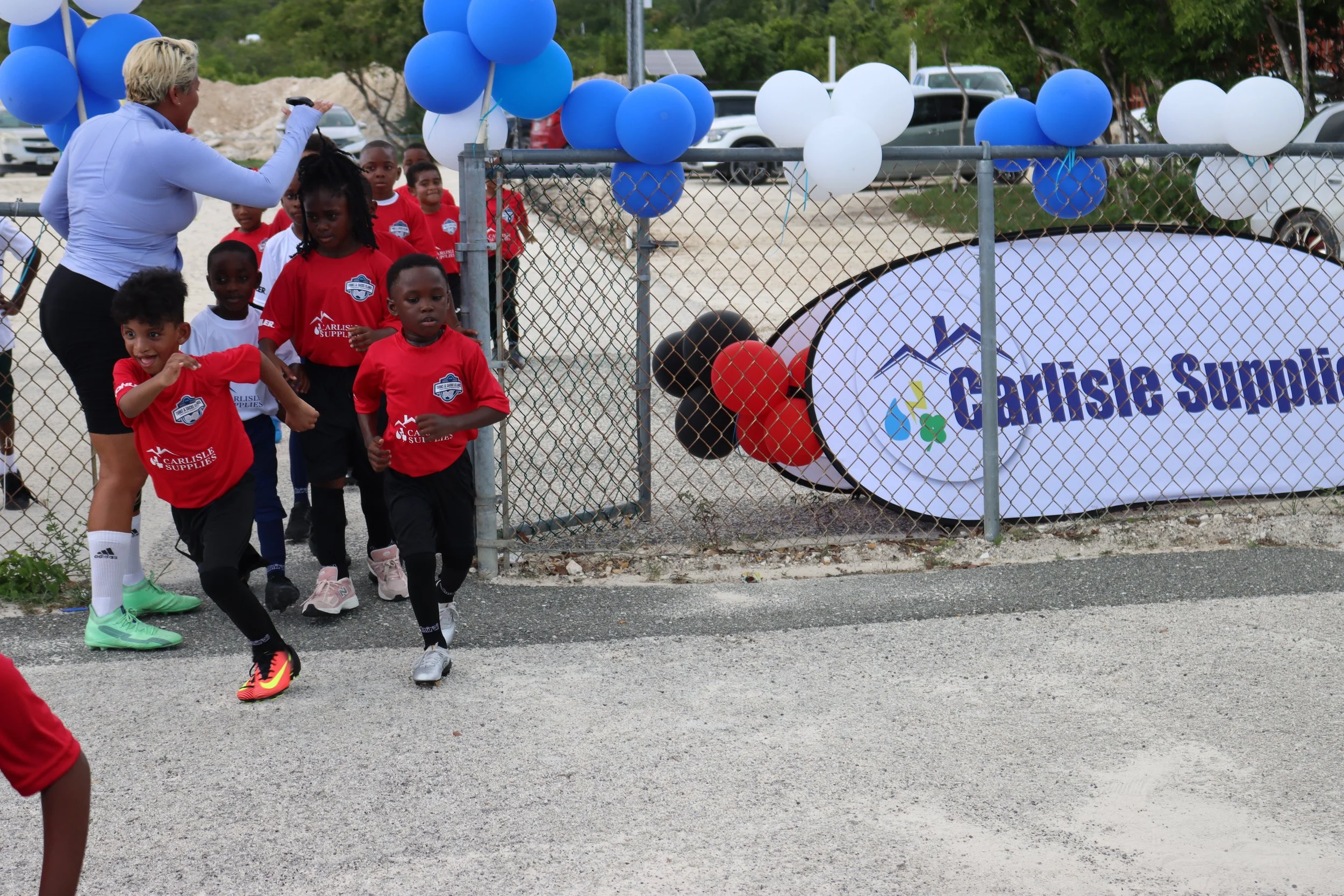 Kick into Action with the Turks and Caicos Islands Football Association's Grassroots Football Programme and Carlisle Supplies