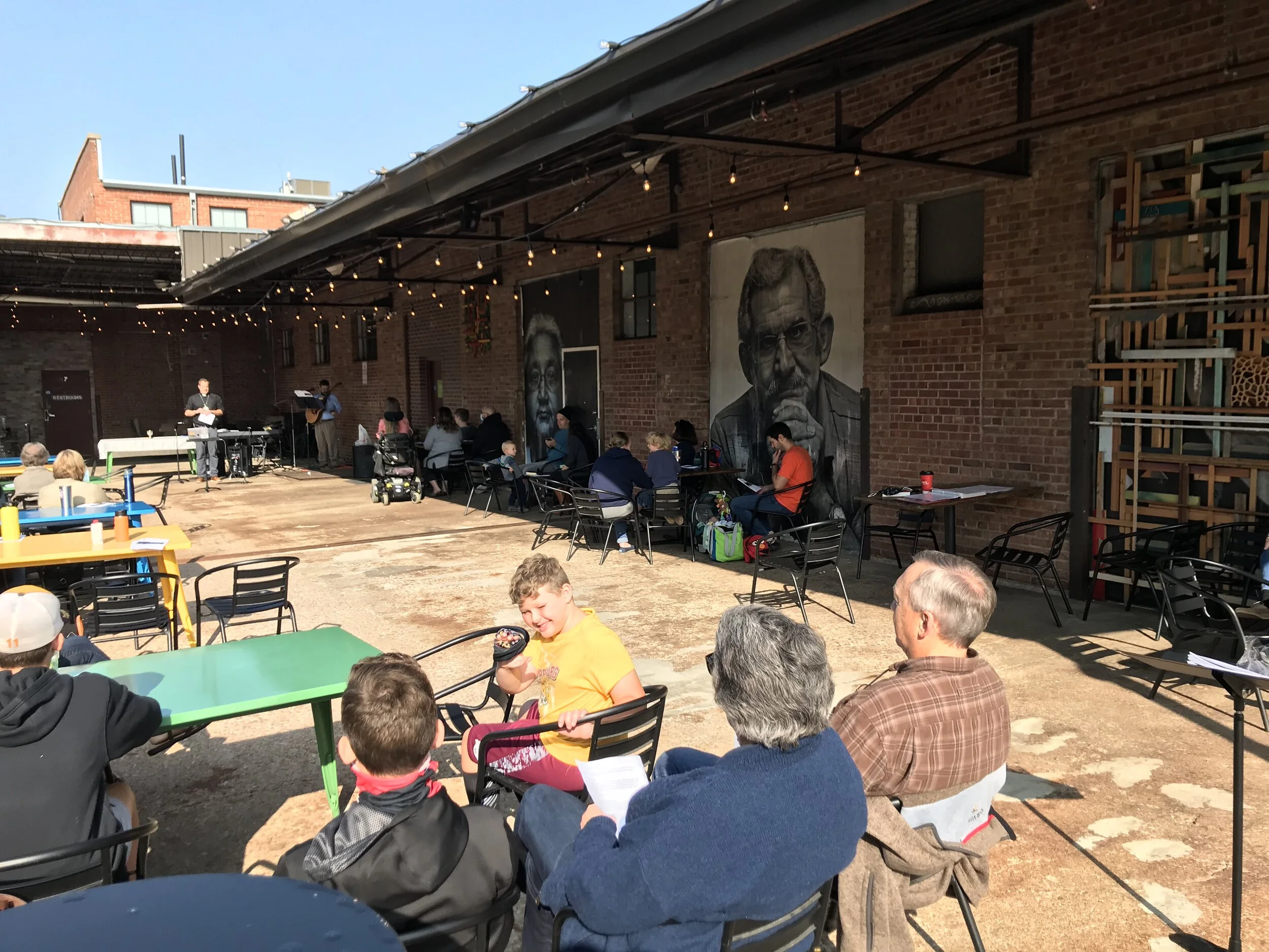 Worshiping on Remedy's patio during the time of COVID