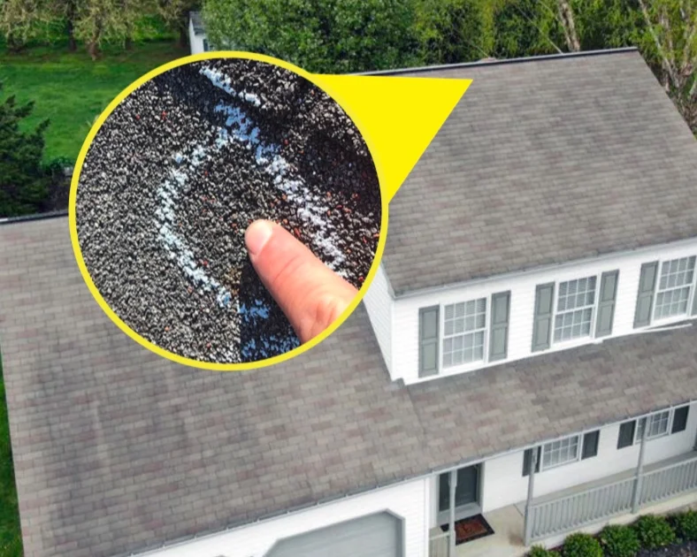 house with close up of hail damage.png