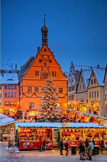 A Christmas market in Rothenburg attracts visitors.