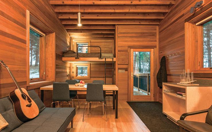 Compact, yet open, this treehouse cabin is a one-of-a-kind vacation destination with room for six guests to comfortably sleep. / Source