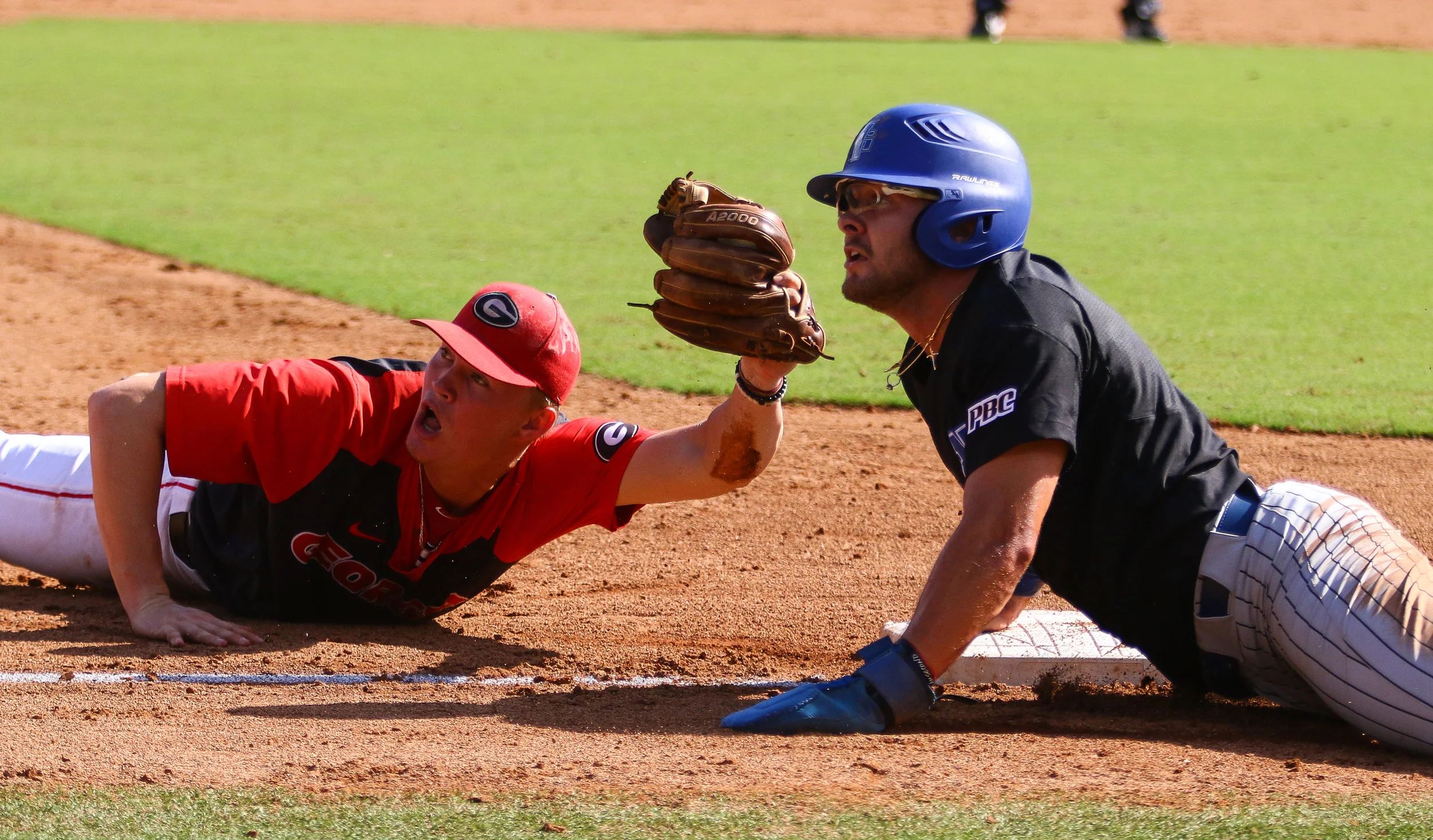 Georgia third baseman Aaron Schunk (22) looks to the umpire to confirm his tag during an exhibition game between the University of Georgia Bulldogs and the University of North Georgia Night Hawks at Foley Field on Sunday, Sept. 30, 2018.