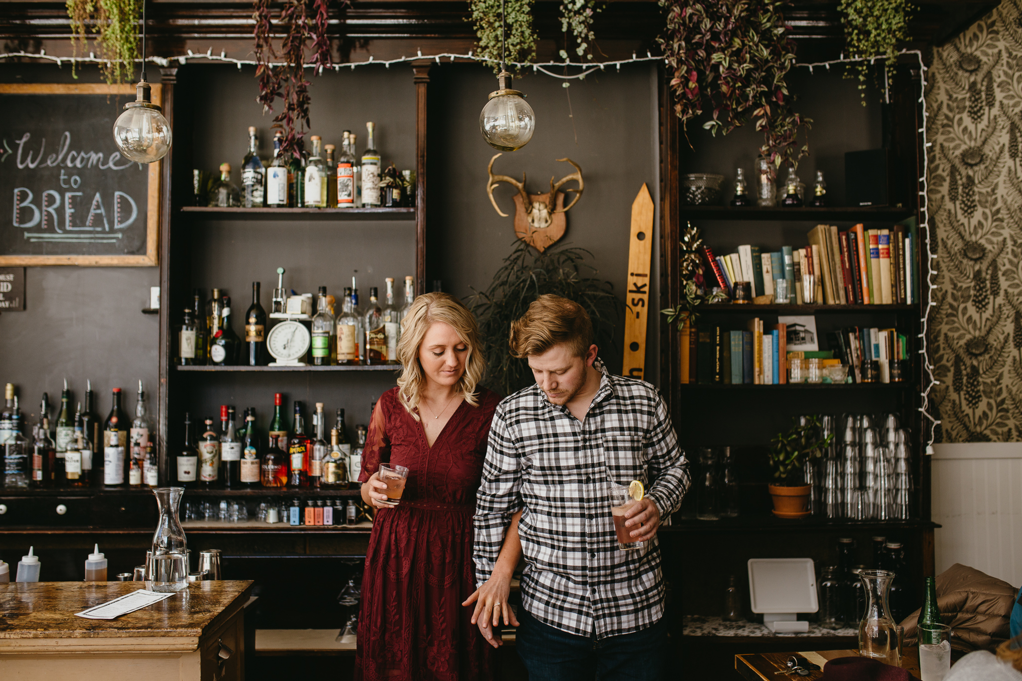 Engaged couple hand in hand Bread Bar, Silver Plume, Colorado.
