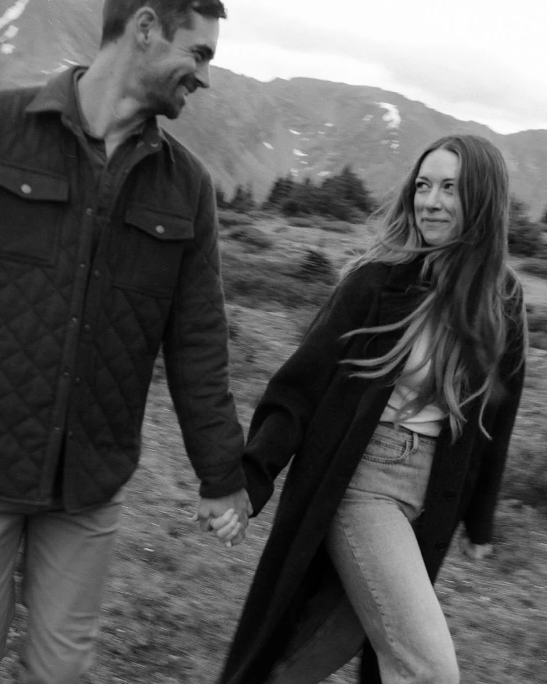 Summer evening engagement sessions in the mountains often mean weather uncertainty. It&rsquo;s rare folks welcome the chance to get caught in the rain&mdash;which is fair, I get it, even if I personally want a downpour or two in my day-to-day life. B