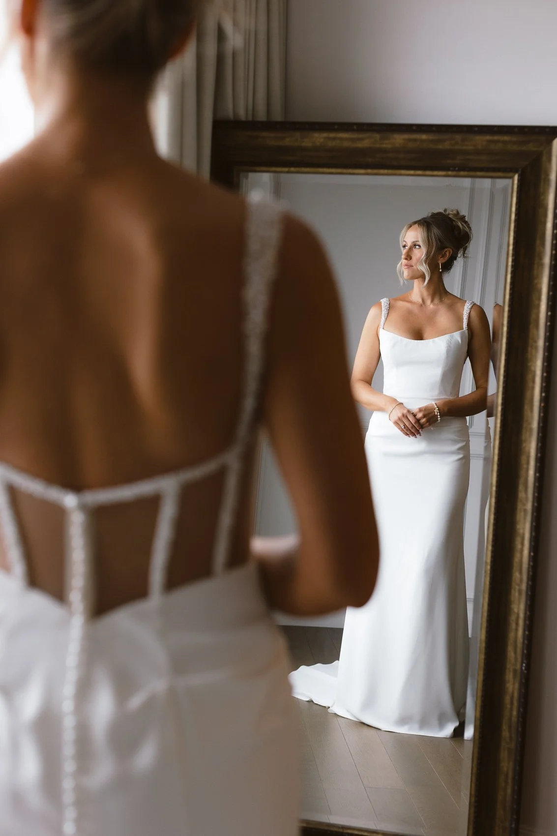  Bride gets ready in the Clio Hotel in Denver, Colorado wedding photographer. 