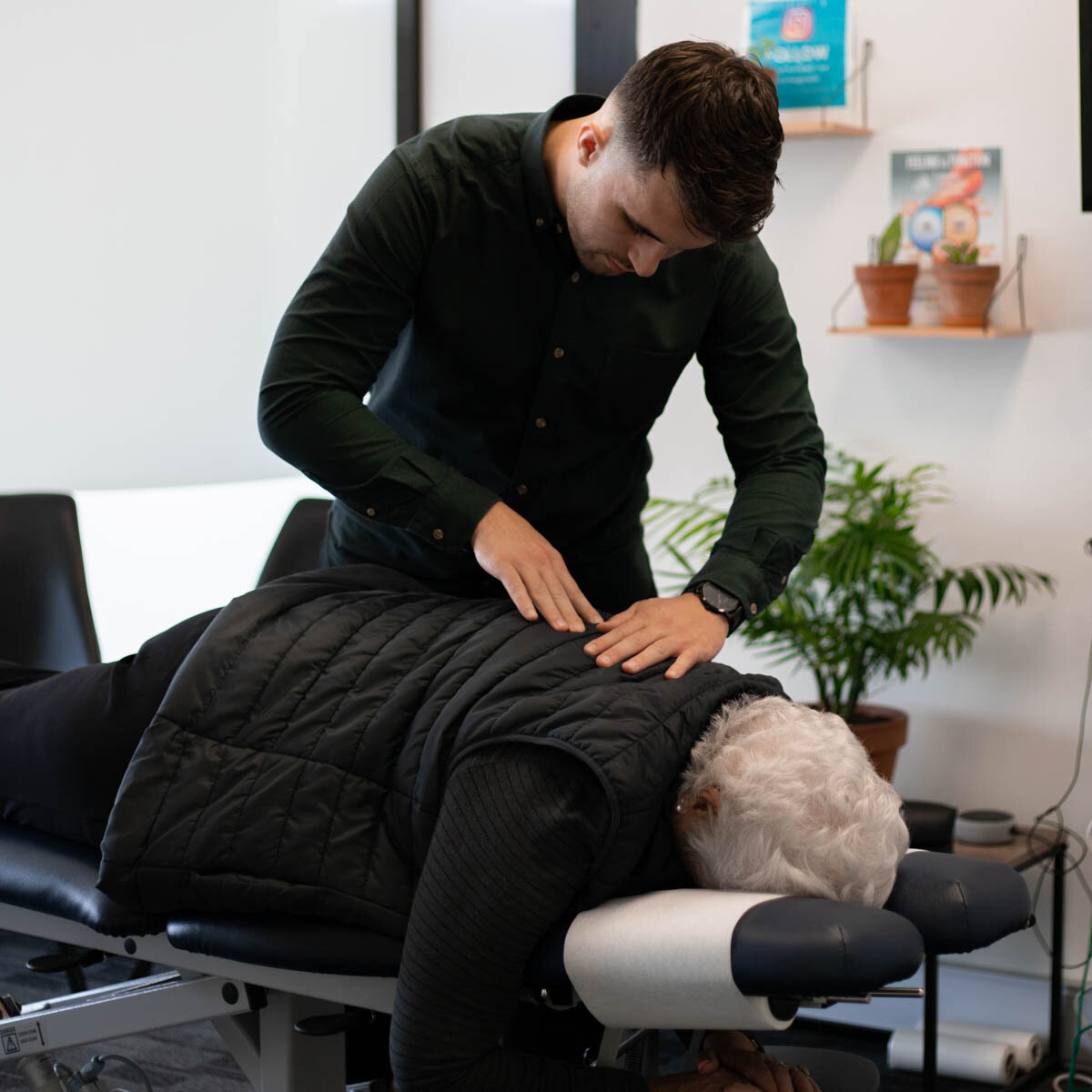 Josh working on an elderly patient