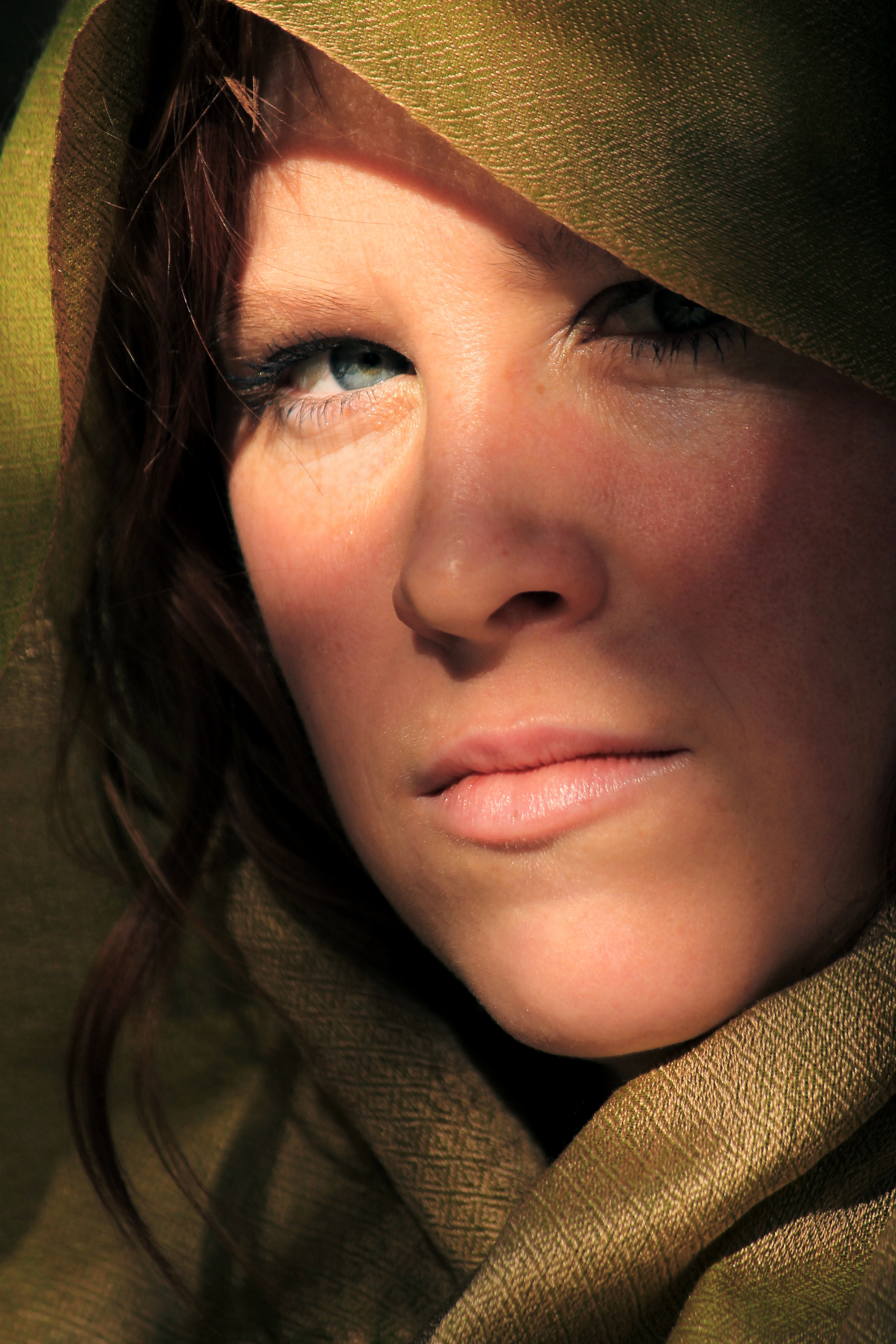 It's amazing what you can come up with as a prop that changes the tone of an image. In this case, it was a scarf. It didn't seem like much, but the more I asked Mandy to move around in the shade and light between tree limbs, the closer we got to this NatGeo-inspired image.