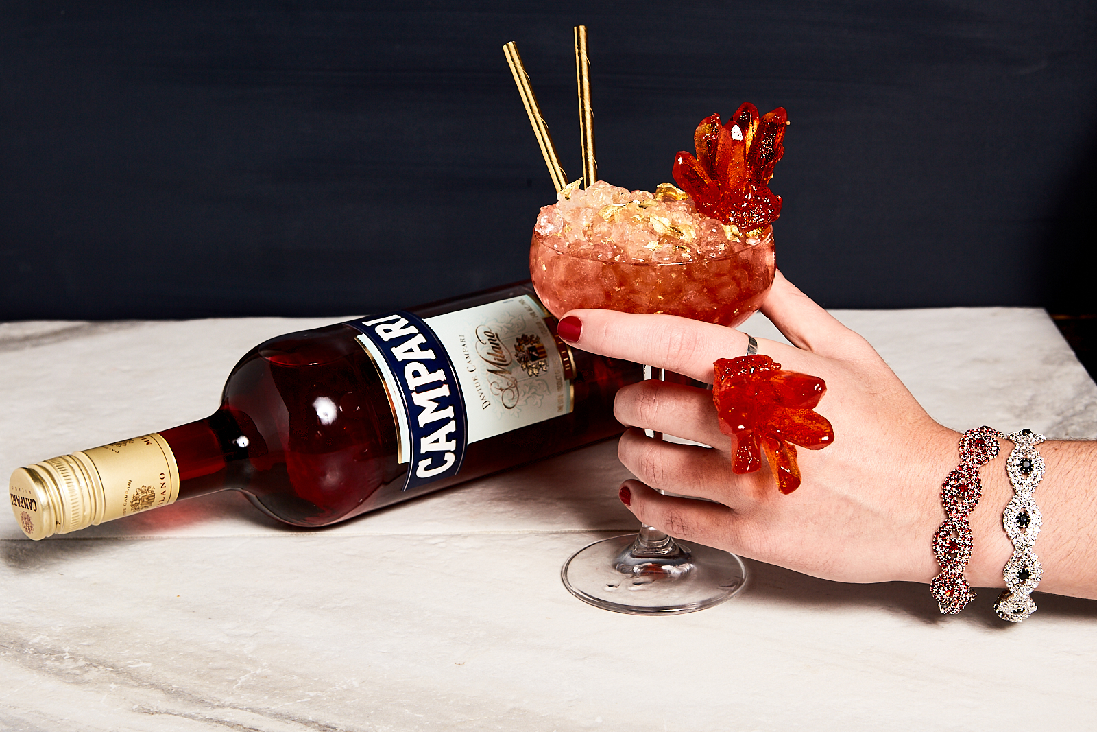 Cocktail Bling_w bottle and hand.jpg