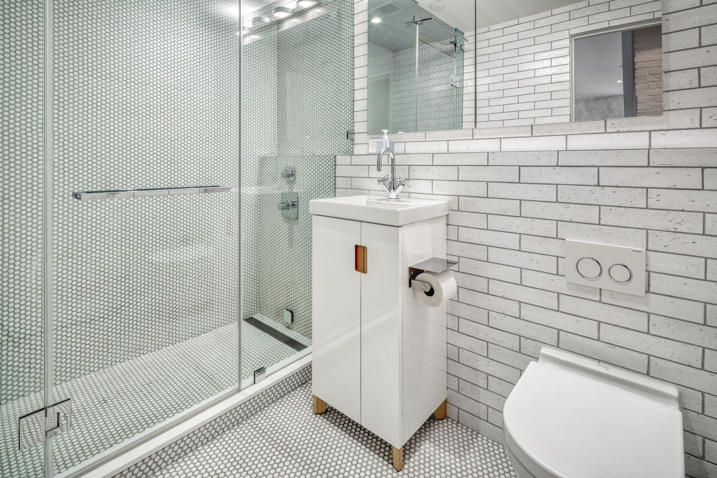  NEW YORK, NY - June 26, 2020: Lower level bathroom of 130 Beekman #5A. CREDIT: Katherine Marks. 