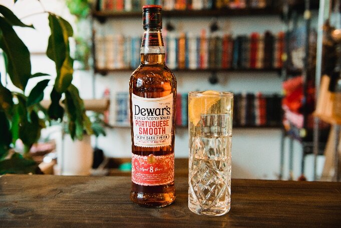  Spiced Tonic Highball   2oz Dewar’s Portuguese Smooth  Fever Tree Aromatic Tonic   Add whisky to chilled highball glass, fill with ice and top with soda. Garnish with the orange.  