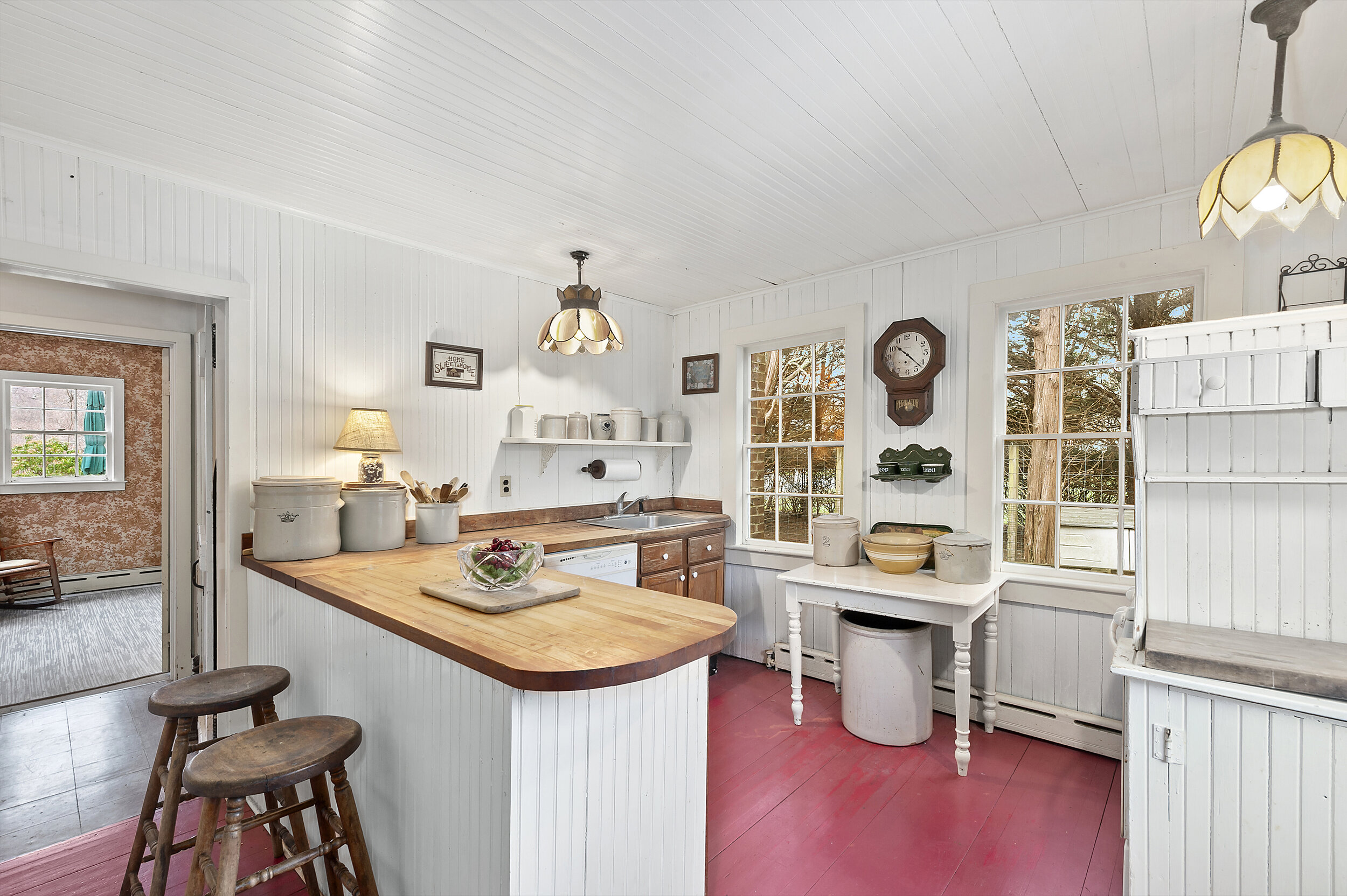  Designated with a Special Historic Landmark by East Hampton Town, the generous South-of-the-Highway property comprises just under an acre of buildable land; a still-standing 275-year-old two-story shingle-style home with three bedrooms, three full b