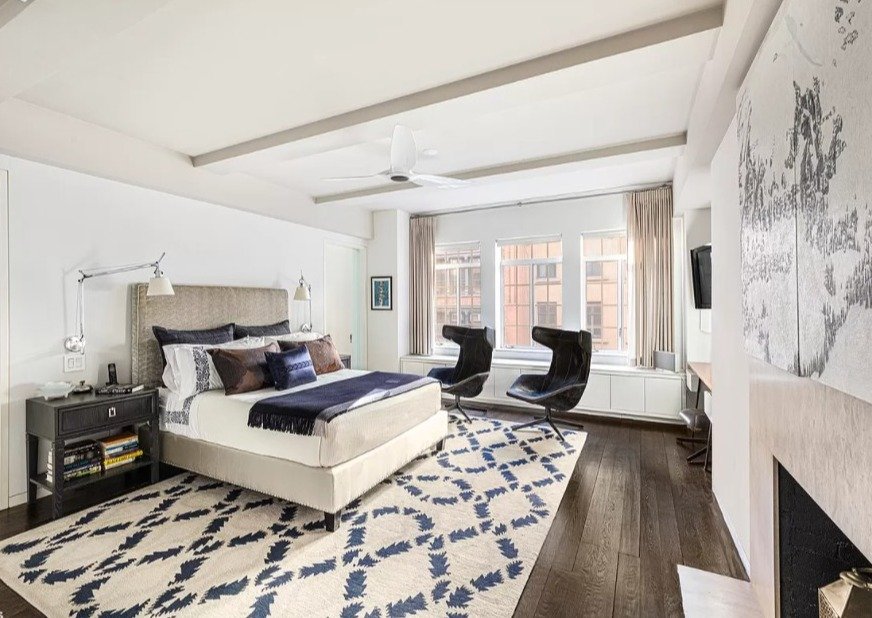  A large second bedroom has windowed en-suite full bath. Rooms are pin-drop quiet with new double paned casement windows. The connecting hallway between bedrooms employs a custom-built office nook. Bookshelves line the third bedroom/den off the livin
